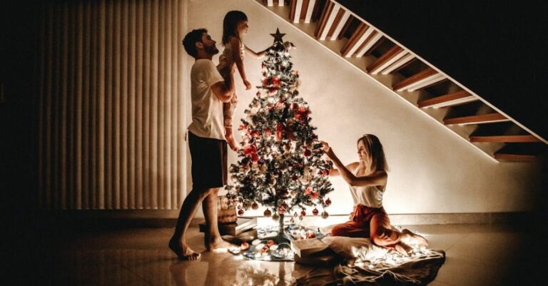 Traditions - Family Decorating Their Christmas Tree