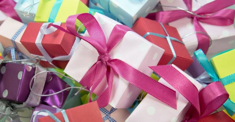 Gifts - Close-up Photo of Assorted-colored Gift Boxes